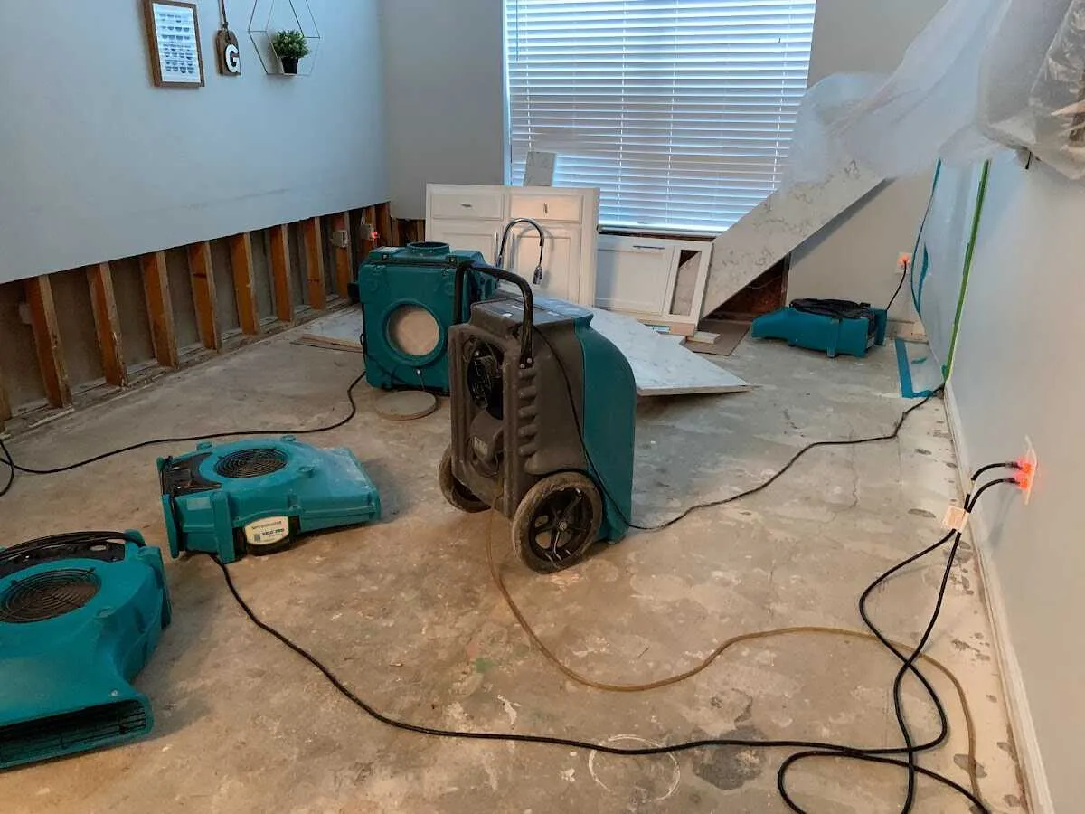 Dehumidifier in flood-cut room for Water Damage Restoration in Syracuse